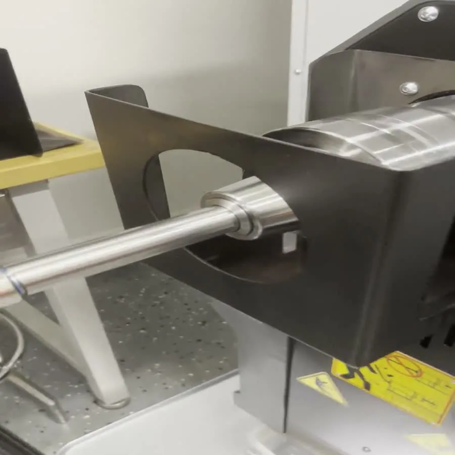 Back-flush coolant fitting on a barrel in the lathe