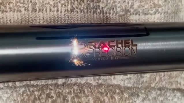 Laser engraving the Rachel Precision logo on a rifle barrel