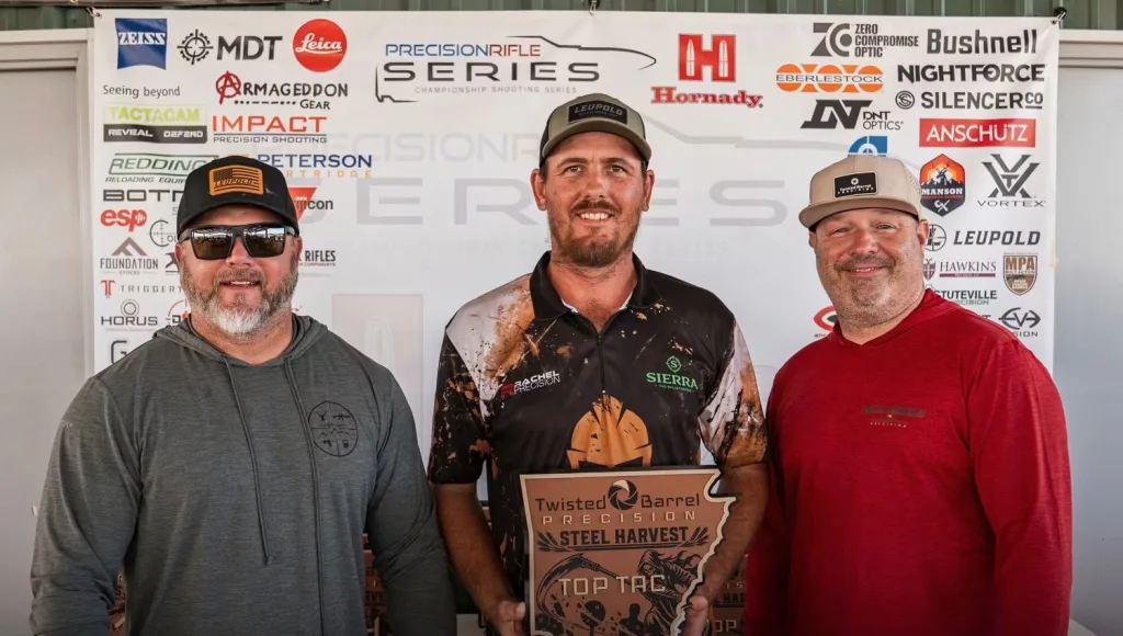 Jaco Van Aswegen in a Rachel Precision jersey holding the Top Tactical plaque at the Twisted Barrel Precision Steel Harvest