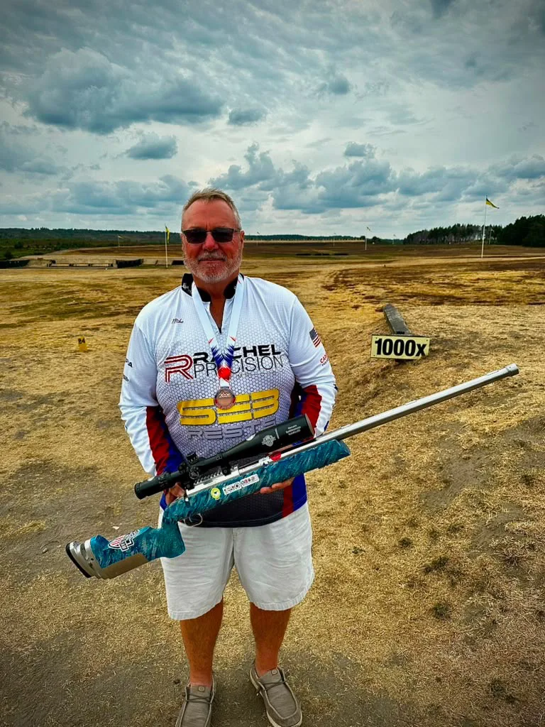 Mike Francis in a Rachel Precision jersey with his medal and F-T/R rifle at Bisley, England