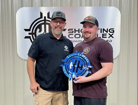 Bradley Grisanti with a South Eastern Open Division plaque