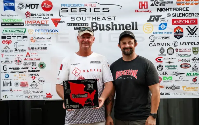 Cole Higginbotham in a Rachel Precision jersey holding a first-place Open plaque at a PRS Southeast match